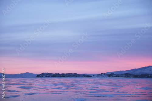 Cape Uyuga sunset landscape. Lake Baikal, winter.