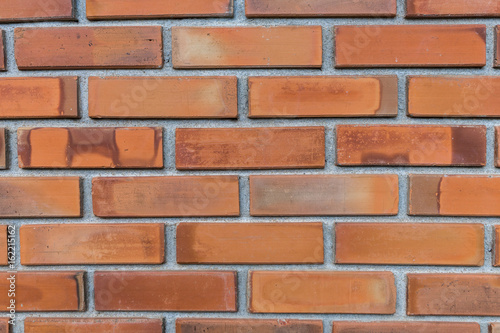 Orange antique brick wall background.