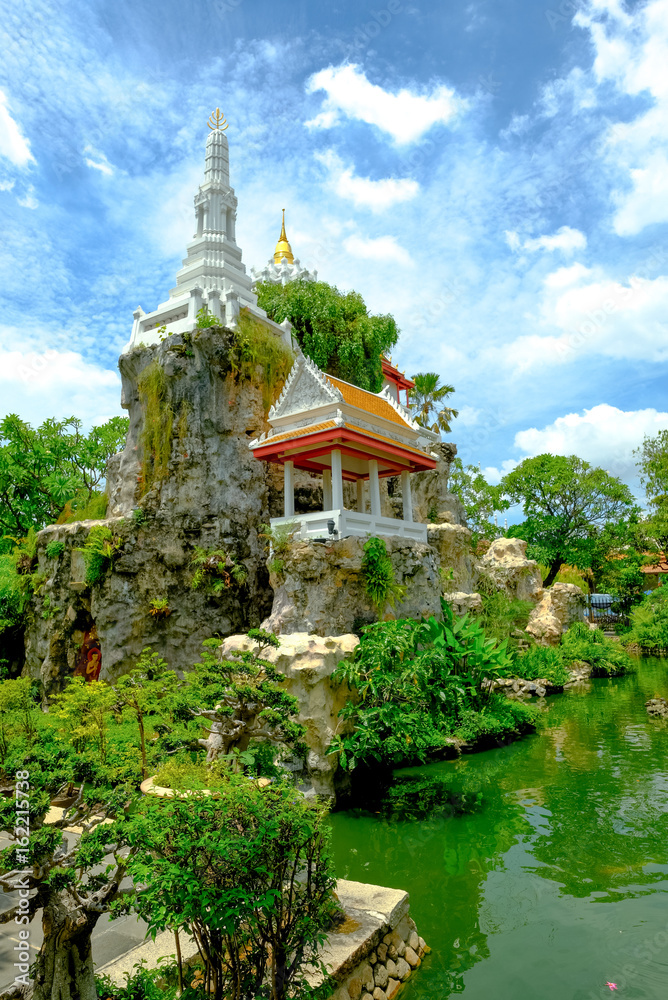 Golden pagoda on Small mountain in garden of Wat Prayoon Wongsawat Worawihan, Bangkok, Thailand Golden pagoda on Small mountain in garden of Wat Prayoon Wongsawat Worawihan, Bangkok, Thailand