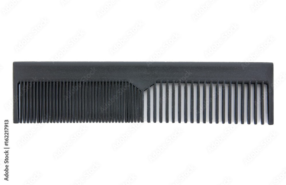 Black plastic hair comb isolated on white background. Black plastic hair comb isolated on white background.
