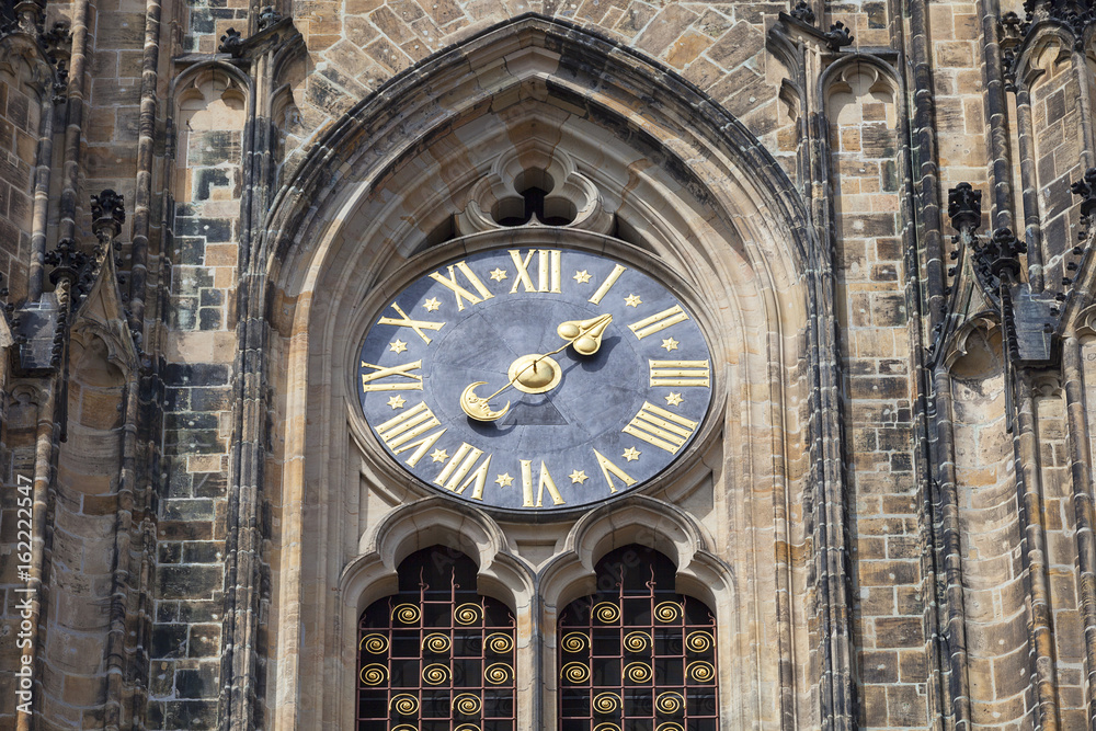 14th century St. Vitus Cathedral , facade, clock, Prague, Czech Republic. 14th century St. Vitus Cathedral , facade, clock, Prague, Czech Republic.