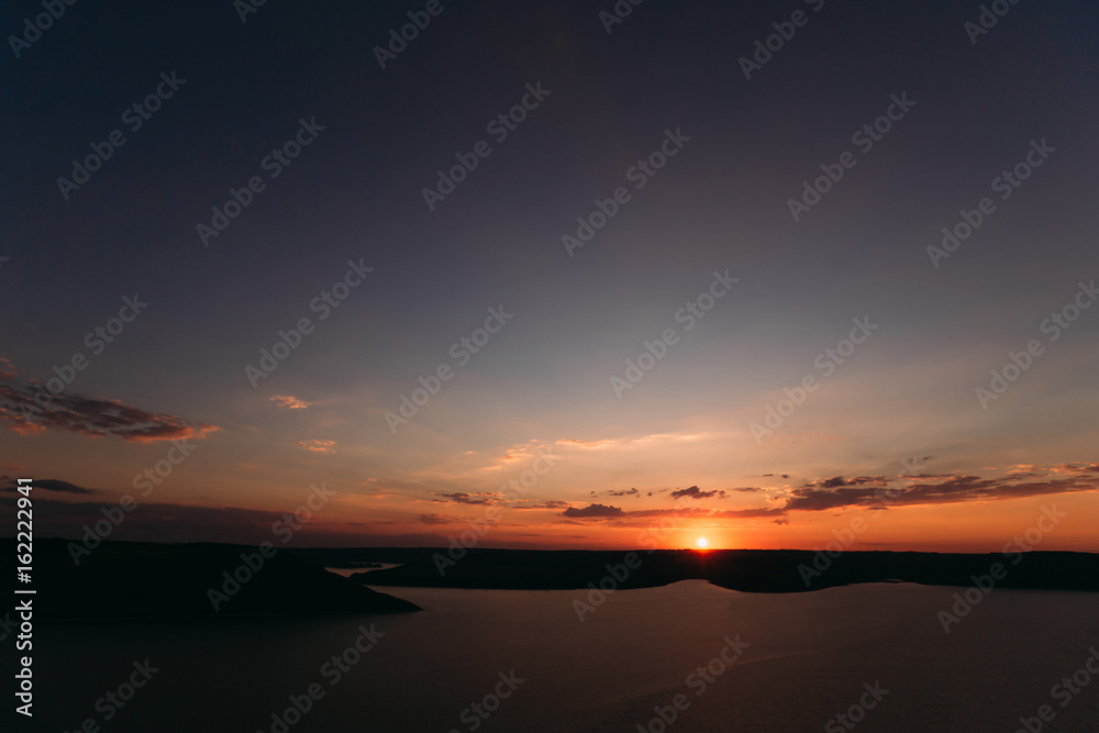 Breathtaking view of sunset on the lake with soft light