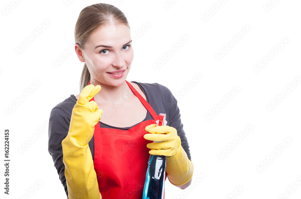 Portrait of attractive maid with cleaning spray Portrait of attractive maid with cleaning spray