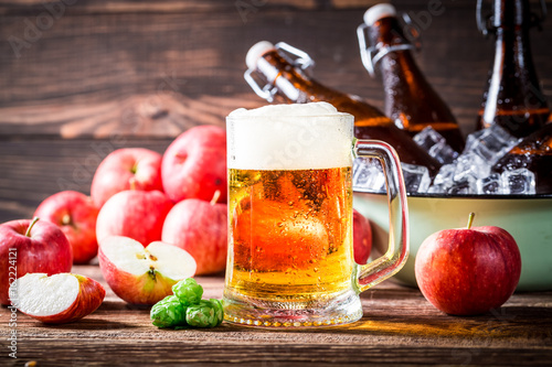 Tableau sur toile Fresh beer made from red apples and hops