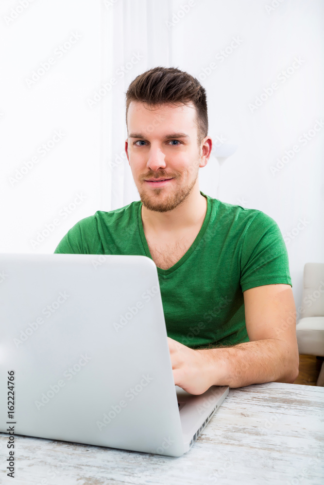 Young man working in the office Young man working in the office
