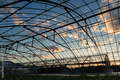 Old greenhouse structure at the sunset in Japanese village rural area photo