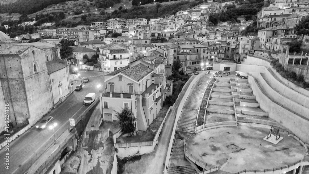 Stilo, Italy. Aerial view of medieval skyline at dusk