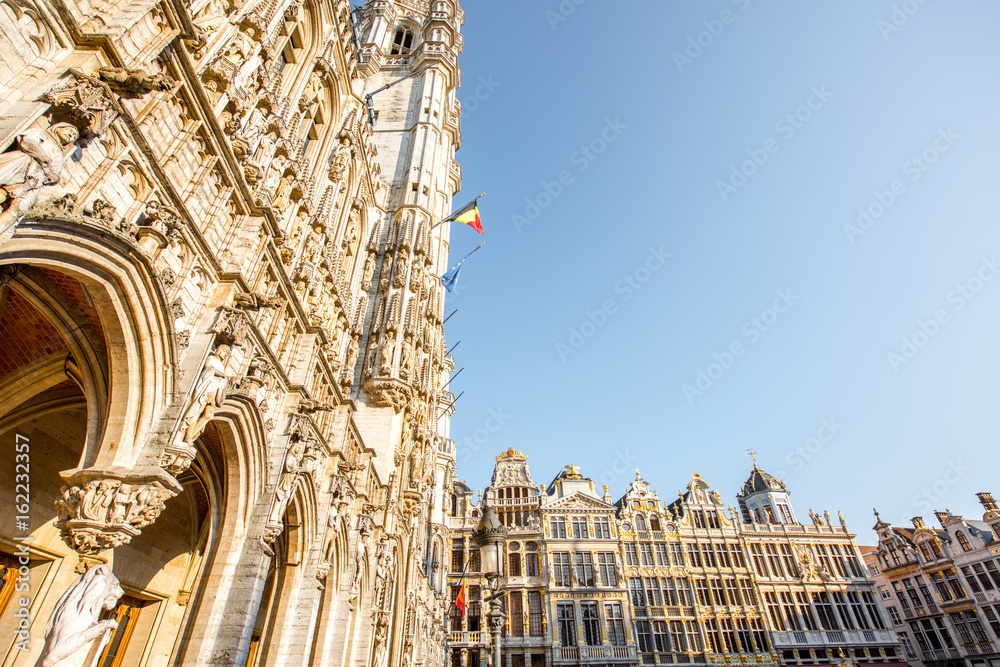 Morning view on the buildings at the Grand place central square in the old town of Brussels during the sunny weather in Belgium