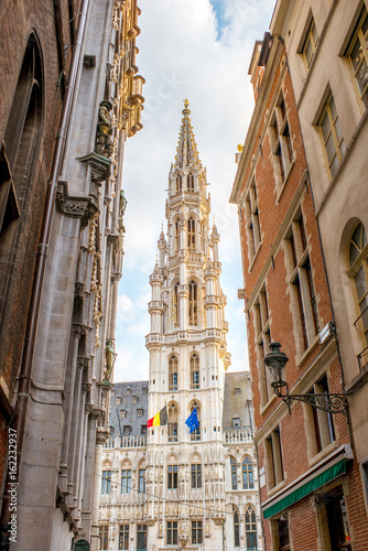 Street view on the cit hall tower on the Grand place central square in the old town of Brussels in Belgium © rh2010