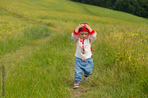 Cute toddler girl with funn...