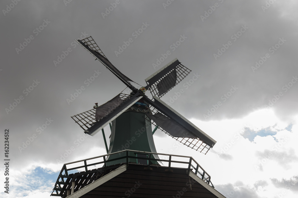 Obraz premium Row of windmills of the Zaanse Schans in Holland, the Netherlands