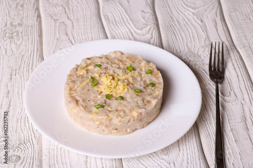 Pearl barley risotto with cheese and green onion