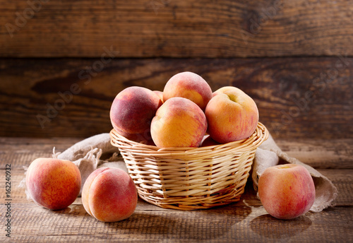 fresh peaches in a basket