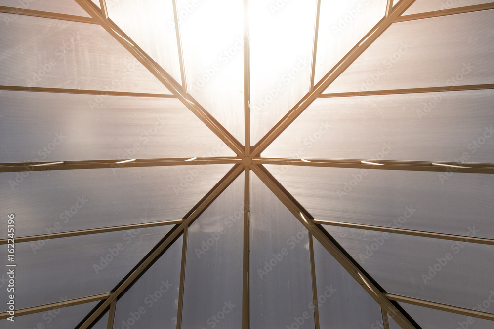 Obraz premium Up view Roof frame and Translucent roof abstract construction