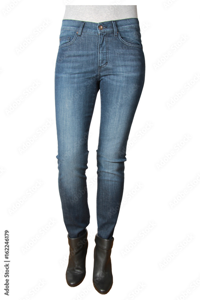 Slim woman in fashionable pants stands against a white background Slim woman in fashionable pants stands against a white background