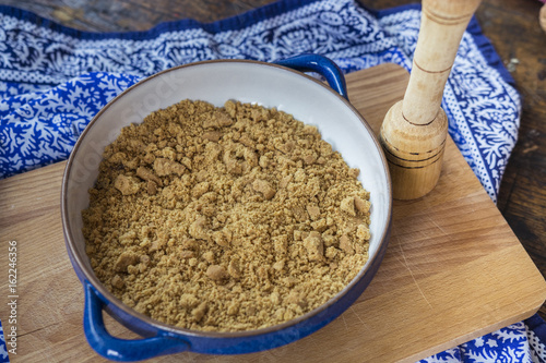 Graham cracker crumb mixed with sugar. Cheesecake in the make.