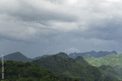 Mountain and sky with storm clouds.
