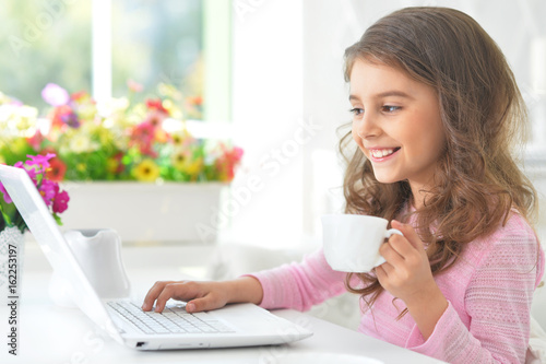  girl using modern laptop