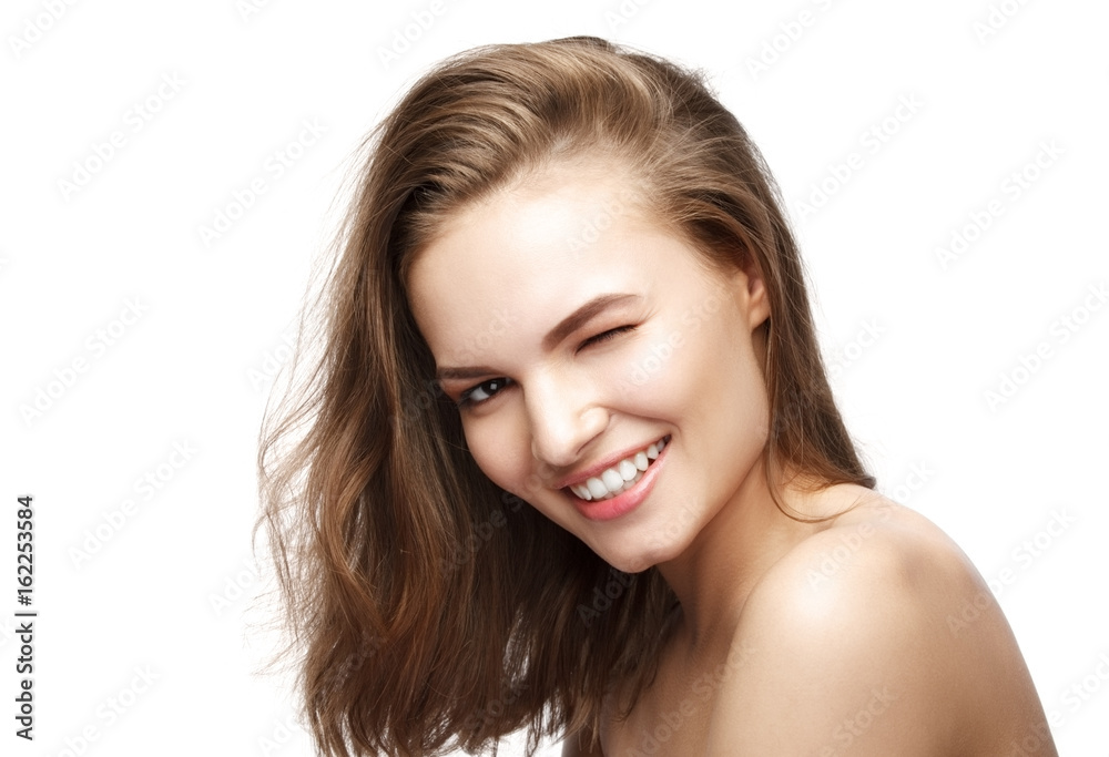 Beautiful sexy attractive cute girl winks and smiles Beautiful sexy attractive cute girl winks and smiles
