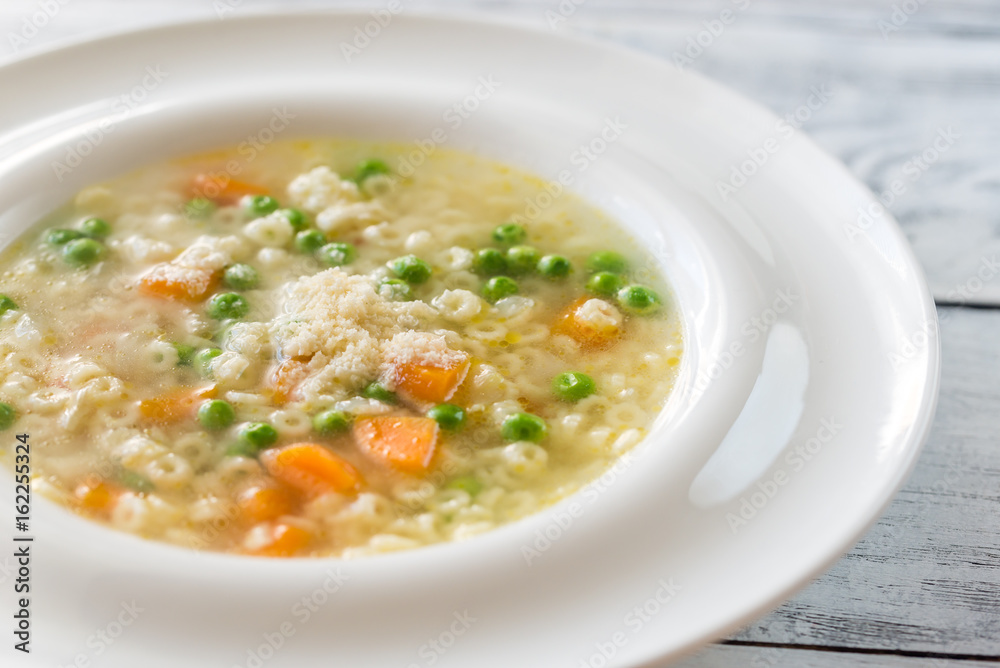 Italian chicken pasta soup with parmesan