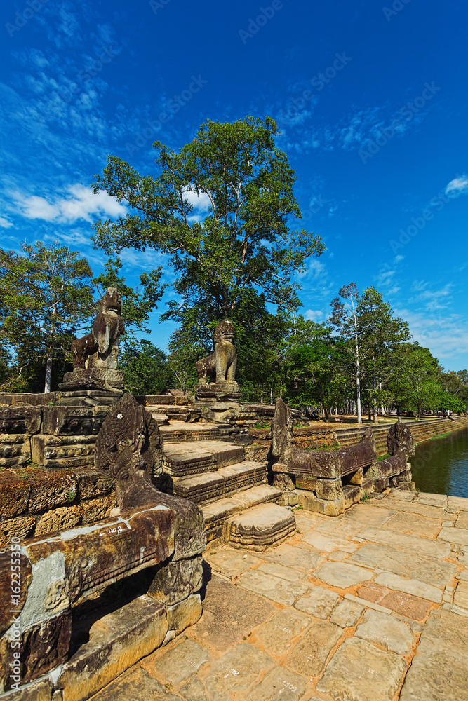 Fototapeta premium Pier of the reservoir in Angkor, Cambodia, Siem Reap