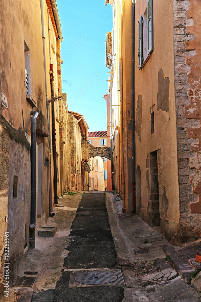 old and narrow street in Hyères - France