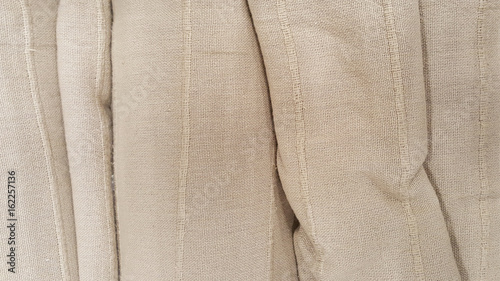 group of grey fabric roll selection / stock of grey fabric for fashion design business, raw material in garment manufacturing