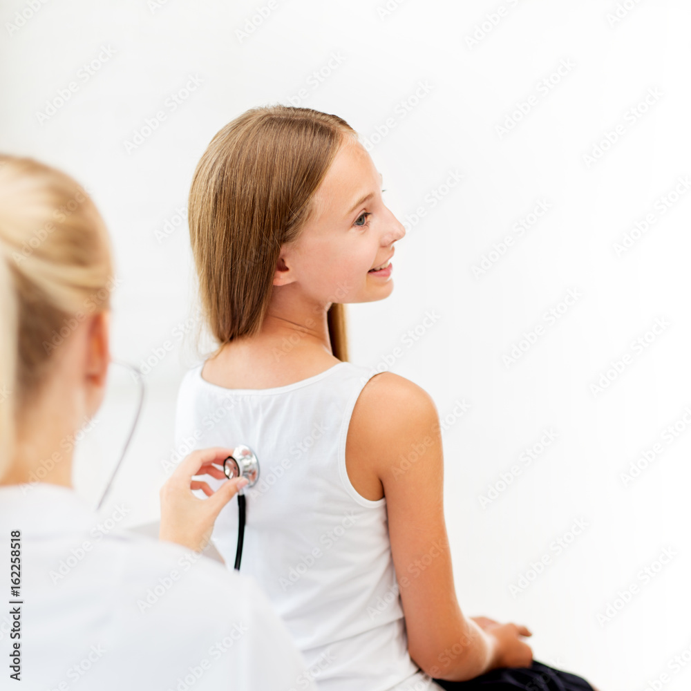 doctor with stethoscope and girl at hospital doctor with stethoscope and girl at hospital