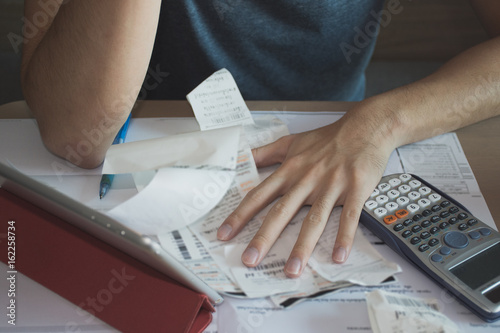 Stressed man shocked with amount to be paid for electricity,financial problem photo