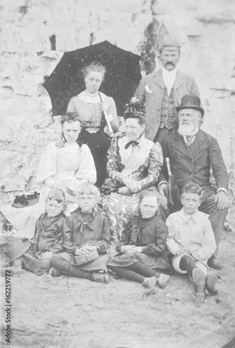 Family group photograph at the seaside. Date: circa 1892