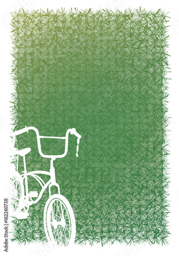 Greensward and white bicycle.