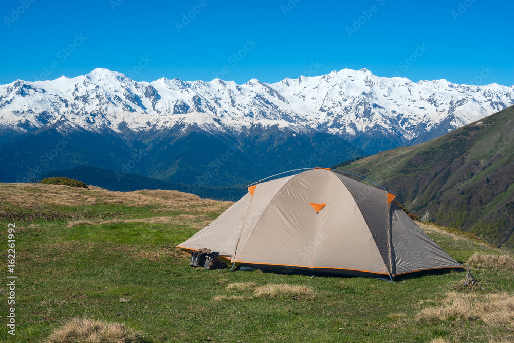 Magic camp in the mountains - a tent on a plateau