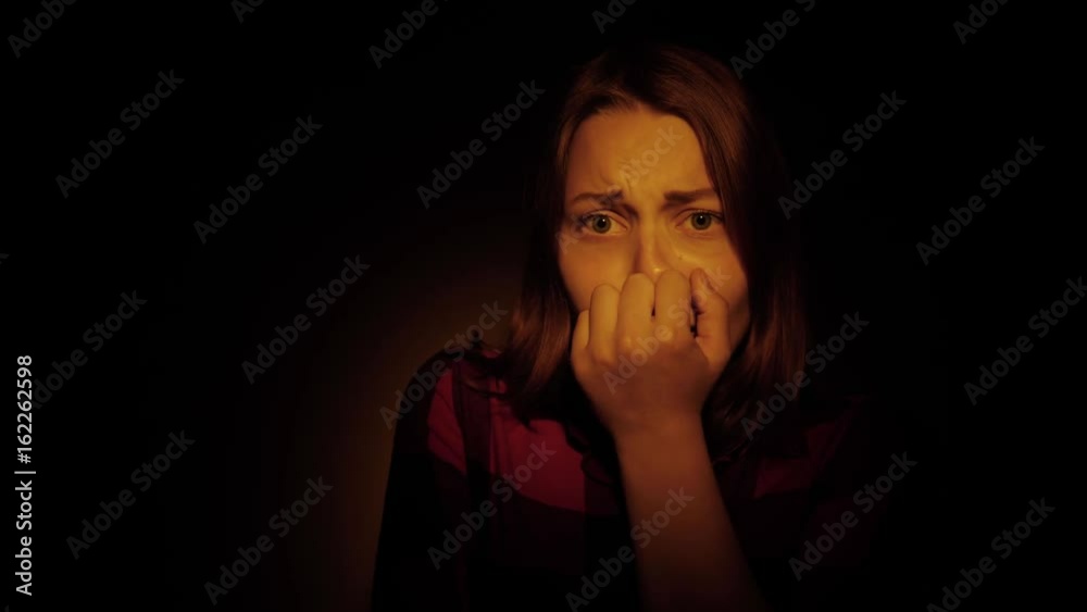 Scared by something teen girl in the dark. 4K UHD. Scared by something teen girl in the dark. 4K UHD.