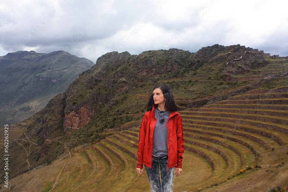 mid age smiling woman on Terraced Inca fields, Peru