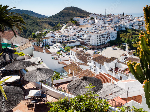 A view over the hillside white village (pueblo blanco) of Frigiliana Anadalusia Spain photo