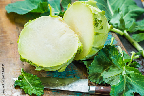 Fresh green kohlrabi with green leaves ready to eat