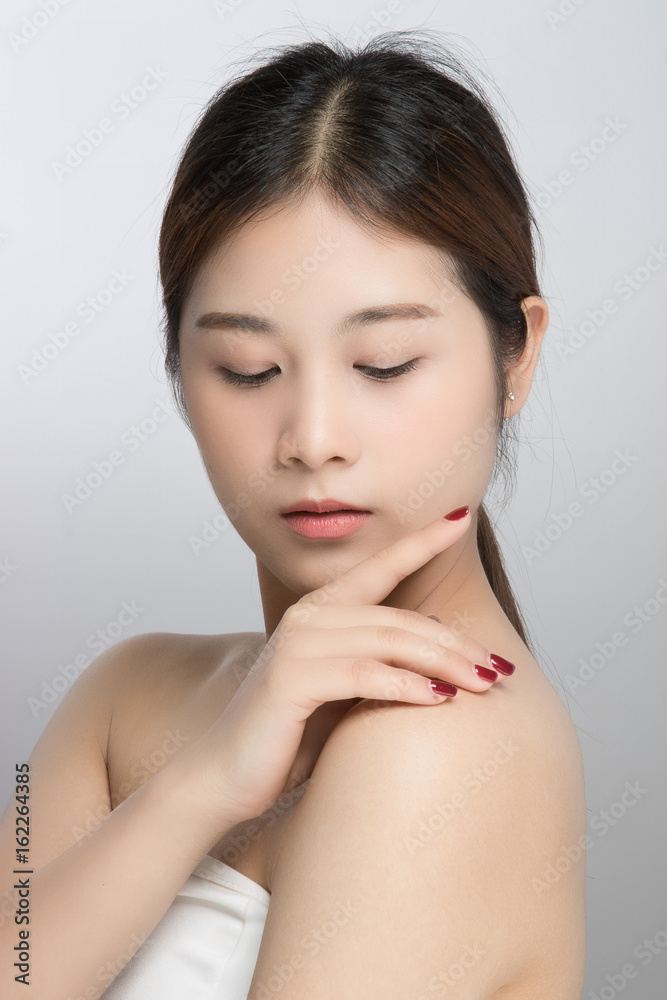 attractive beautiful asian woman skin care on white background attractive beautiful asian woman skin care on white background