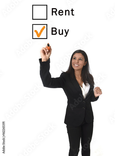  latin businesswoman in office suit writing with marker in housing buy rent real estate concept choosing