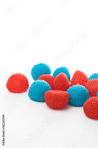 Red and Blue Candies on White Background Vertical © rstpierr