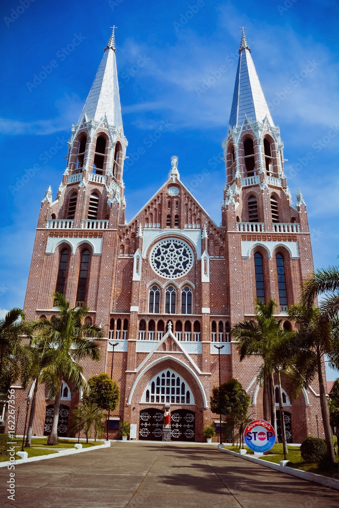 Fototapeta premium Beautiful view of Saint Mary's Cathedral in blue sky in Yangon, Myanmar