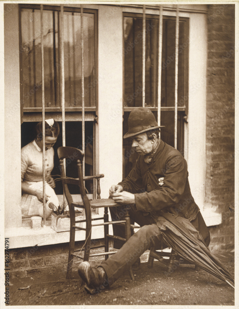 Fototapeta premium Man Mending a Chair. Date: 1877
