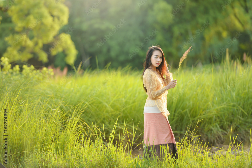 Asian woman wearing traditional thai culture lanna style,vintage style,chaingmai Thailand Asian woman wearing traditional thai culture lanna style,vintage style,chaingmai Thailand
