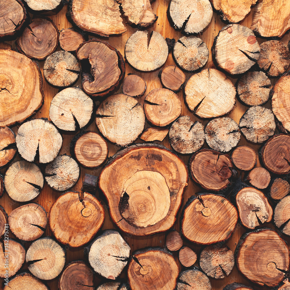 Close up of pile of wooden logs for background or texture, top view Close up of pile of wooden logs for background or texture, top view