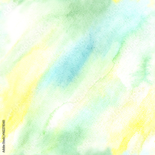 Bright Seamless Watercolor Abstract Pattern. Mix of Blue, Green and Yellow Blurred Color Splashes. Colorful Texture. Hand Painted Background