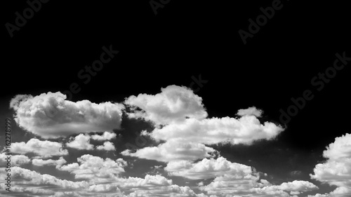 Black sky and white clouds