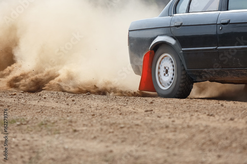 Rally Car turning in dirt track (rear wheel drive)