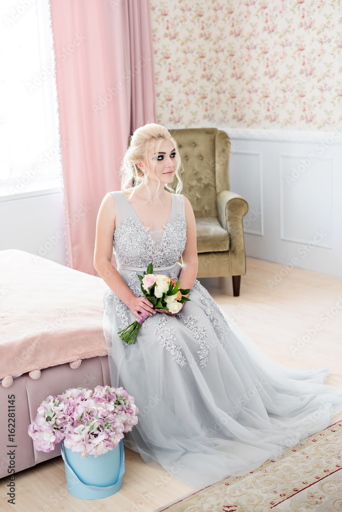 Fashion bride in gray dress with make-up smoky eyes Fashion bride in gray dress with make-up smoky eyes