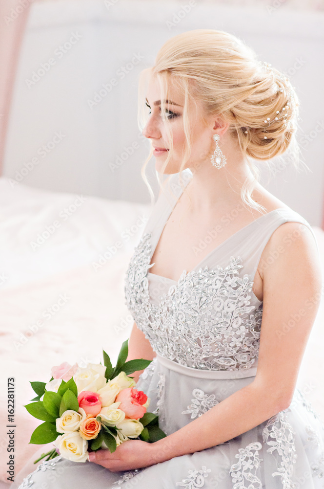 Fashion bride in gray dress with make-up smoky eyes Fashion bride in gray dress with make-up smoky eyes