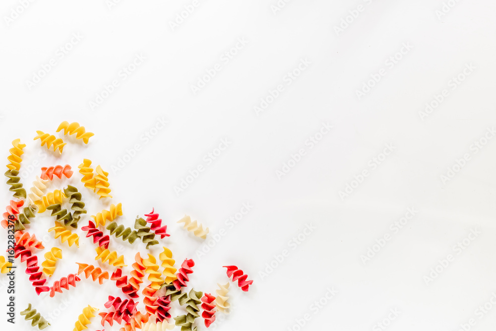 Fusilli pasta on white background top view copyspace Fusilli pasta on white background top view copyspace