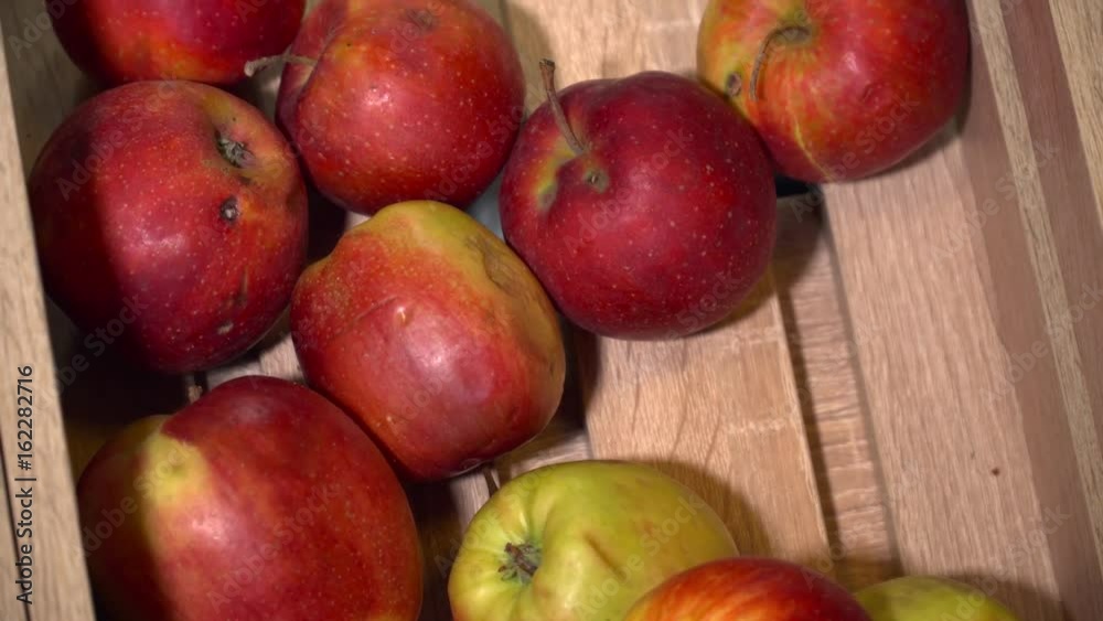 Closeup of red apples on the wooden box Closeup of red apples on the wooden box